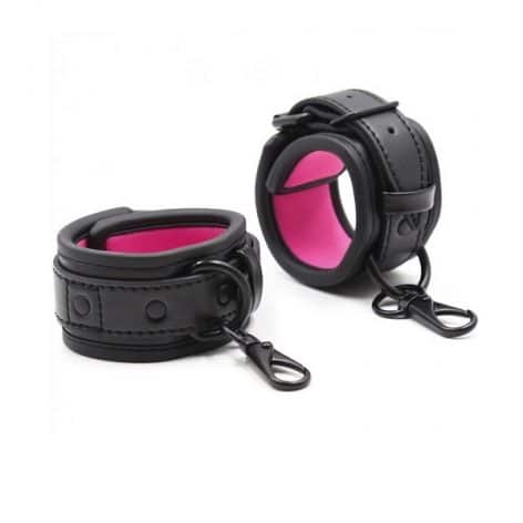pink and black neopren and faux leather hand cuffs